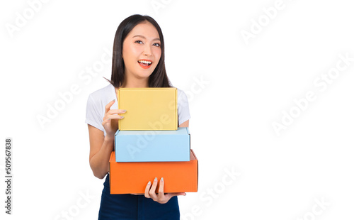 Happy cute asian woman smiling and holding package online marketing and delivery Start a small business at home on white background, Delivery shipping service concept.