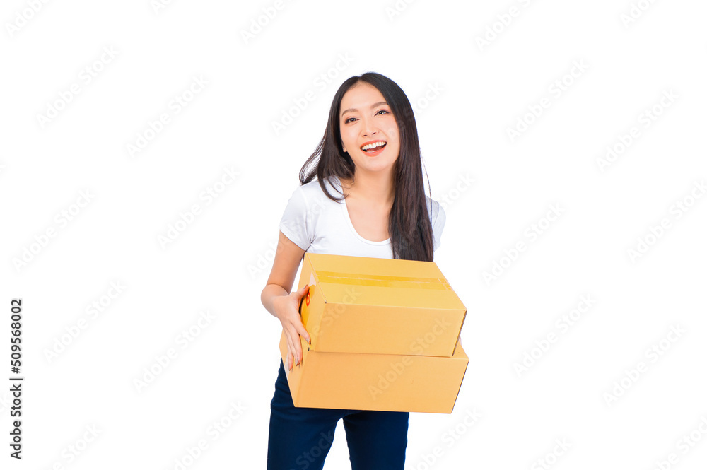 Happy cute asian woman smiling and holding package online marketing and delivery Start a small business at home on white background, Delivery shipping service concept. Happy cute asian woman smiling and holding package online marketing and delivery Start a small business at home on white background, Delivery shipping service concept.