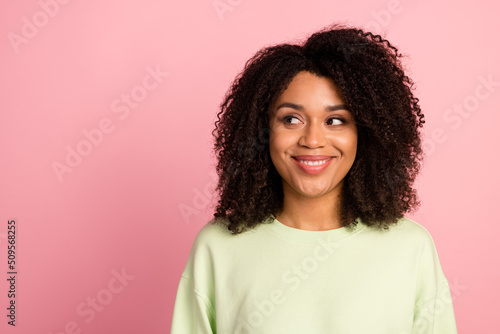 Photo of youth girl wonder guess look empty space imagiantion plan isolated over pink color background