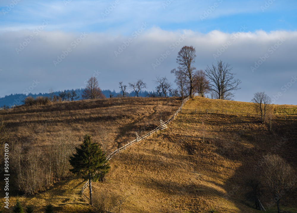 Last good weather days in autumn mountain countryside. Peaceful picturesque Ukrainian Carpathians mountains scene.