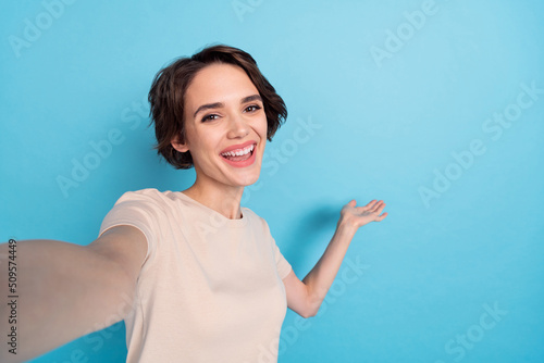 Photo of young positive young lady enjoy free time make summer vacation trip video vlog isolated on blue color background #509574449