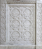 Marble stone carving with geometric, plant and bird motifs. Handmade. marble texture. Byzantine motifs in the decoration of Orthodox churches.