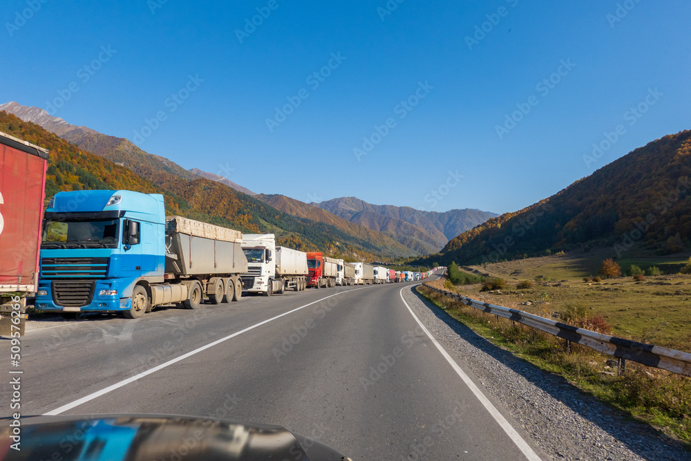 Trucks stuck on roadside in countryside