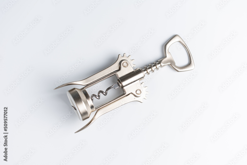 Mechanical corkscrew. Wine bottle opener on white background. Mechanical corkscrew. Wine bottle opener on white background.