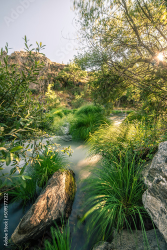 Spring sunset on the Lozoya river, this water course, which has its source in the Peñalara natural park, on the Madrid slope of the Sierra de Guadarrama © NumenPhoto