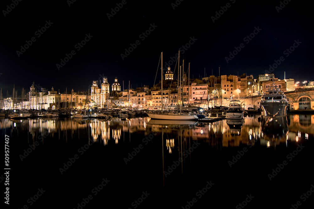 Silhouette and night reflections of the Valletta.Malta