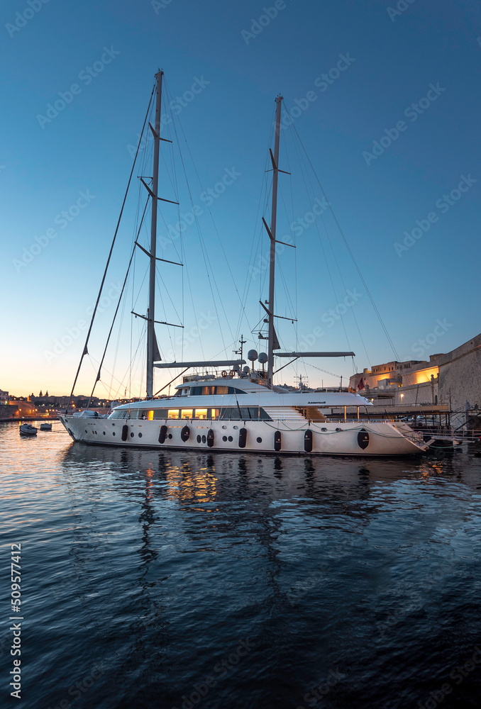 Fototapeta premium Silhouette and night reflections of the Valletta.Malta
