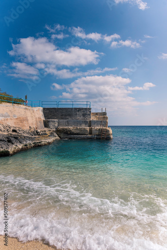 The characteristic turquoise waters of the island of Gozo, Malta. photo