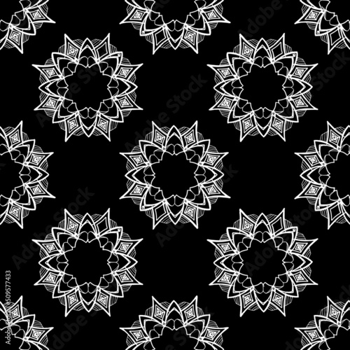 SEAMLESS mandala PATTERN with isolated white lines. Geometric pattern of rare floral mandalas on black for print design