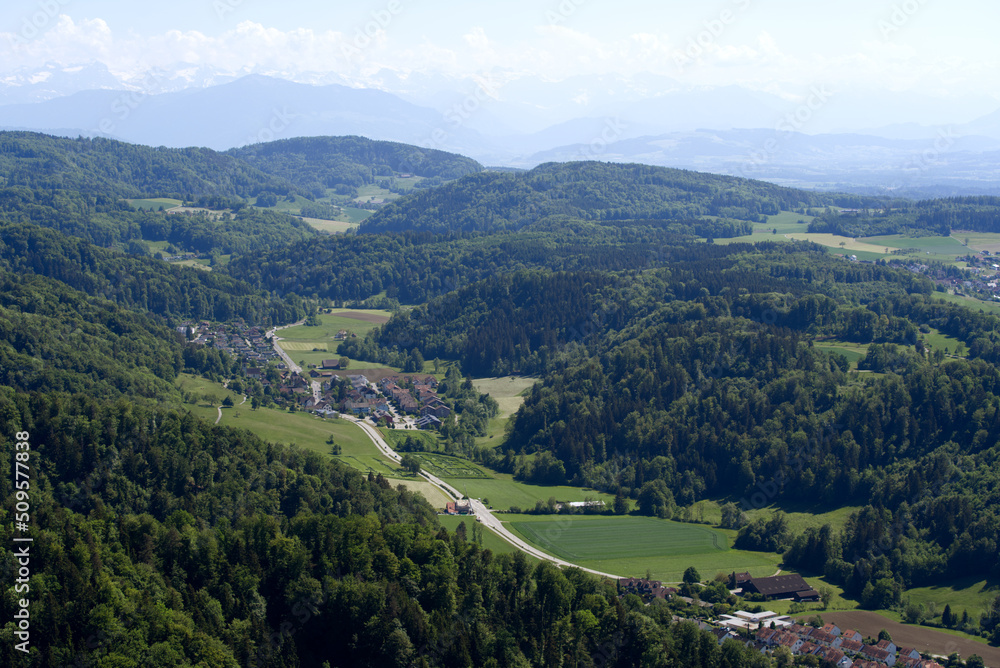 Aerial view of Canton Zürich with village Stallikon in the background seen from local mountain Uetliberg on a sunny spring day. Photo taken May 18th, 2022, Zurich, Switzerland. Aerial view of Canton Zürich with village Stallikon in the background seen from local mountain Uetliberg on a sunny spring day. Photo taken May 18th, 2022, Zurich, Switzerland.