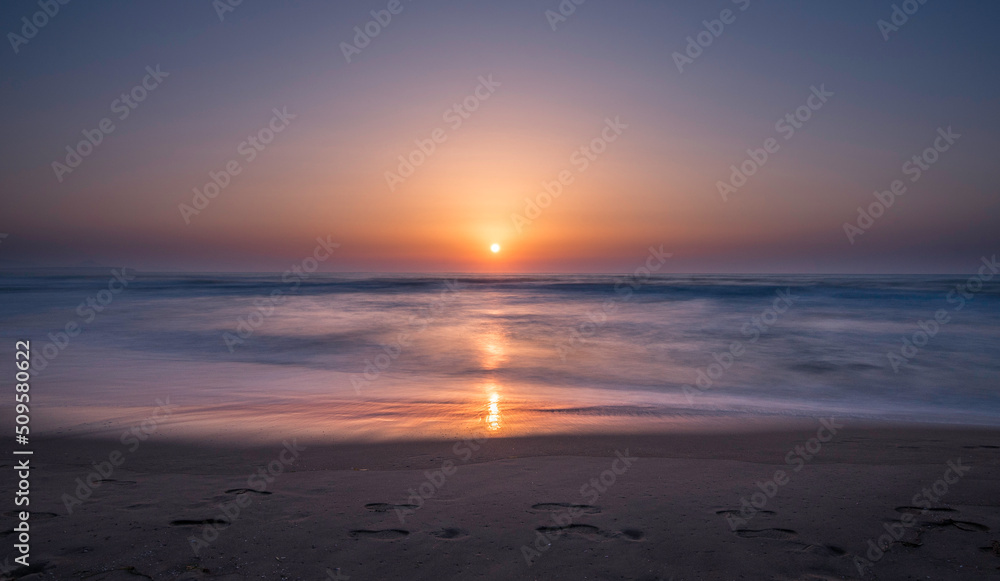 Summer sunrise on the beach of Guardamar del Segura, Alicante. Summer sunrise on the beach of Guardamar del Segura, Alicante.