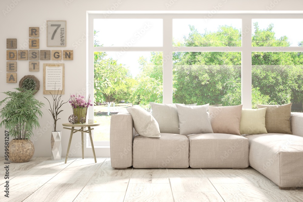 Fototapeta premium White living room with sofa and summer landscape in window. Scandinavian interior design. 3D illustration