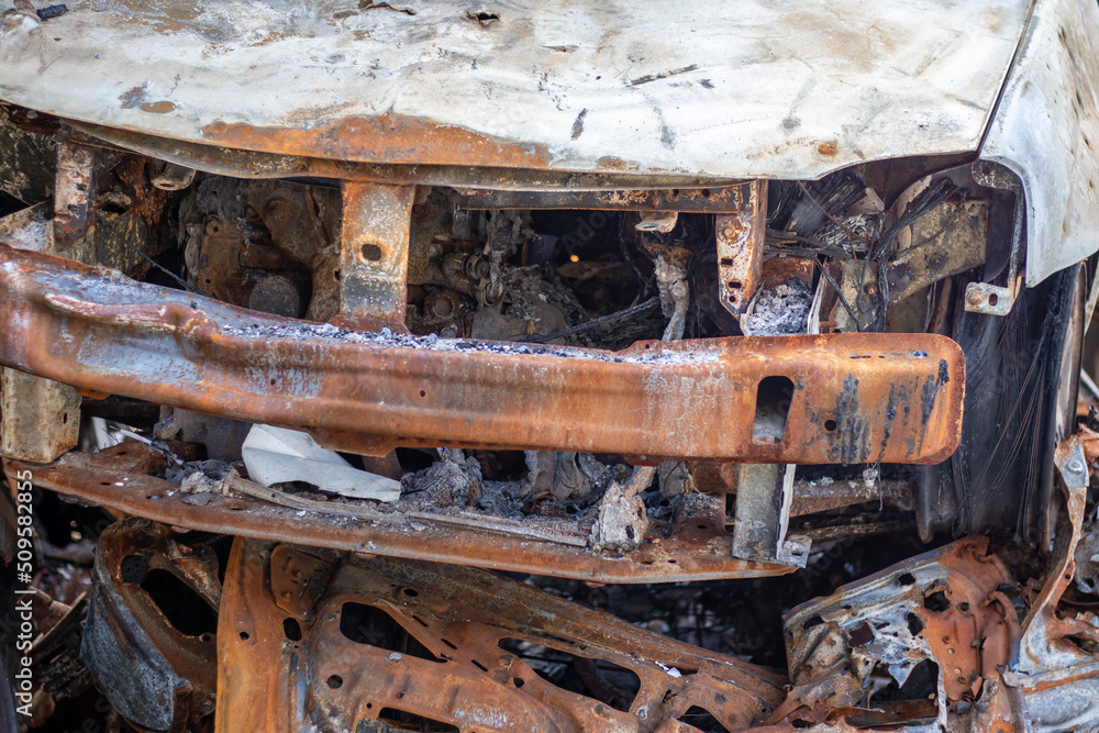 Russian invasion of Ukraine in 2022, destroyed and burned cars. Cars were beaten with shrapnel and burned. Irpensky automobile cemetery. The consequences of the war in a peaceful city near Kyiv. Russian invasion of Ukraine in 2022, destroyed and burned cars. Cars were beaten with shrapnel and burned. Irpensky automobile cemetery. The consequences of the war in a peaceful city near Kyiv.