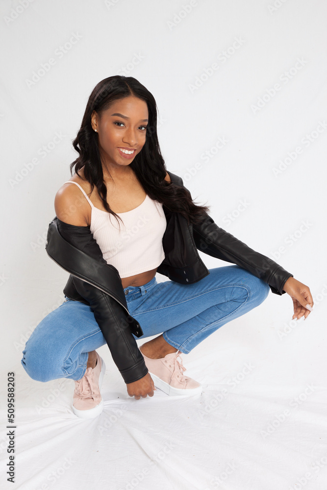 Lovely woman smiling in a squat Lovely woman smiling in a squat
