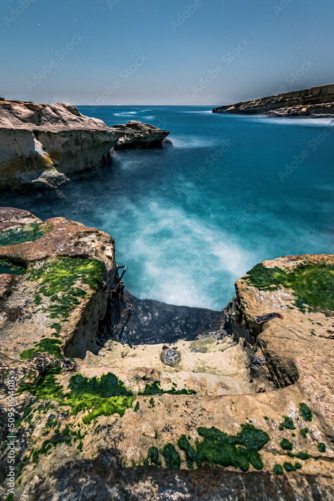 Access stairs to the famous beach of St. Peter's Pool, Marsaxlokk, Malta.