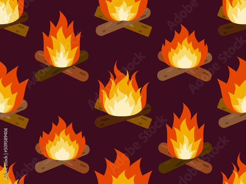 Burning bonfire seamless pattern. Burning firewood and flames in flat style. Design for print, banners and wrapping paper. Vector illustration
