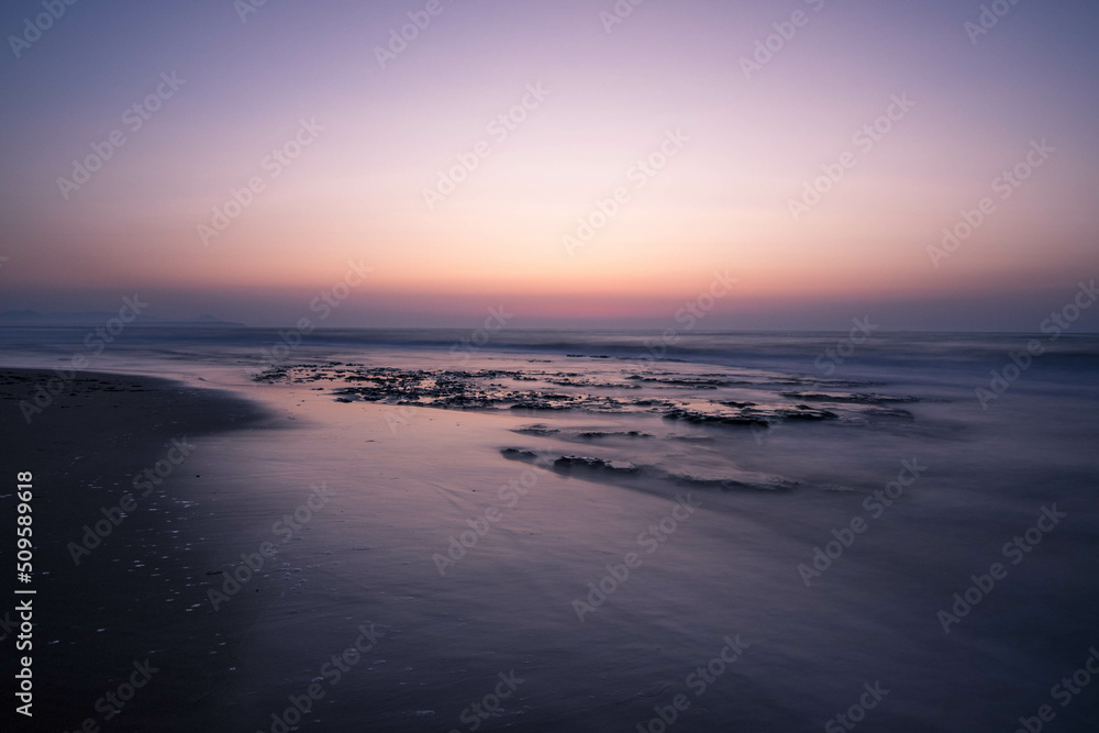 Sunrise in the waters of Guardamar del Segura beach, Alicante, Spain. Sunrise in the waters of Guardamar del Segura beach, Alicante, Spain.