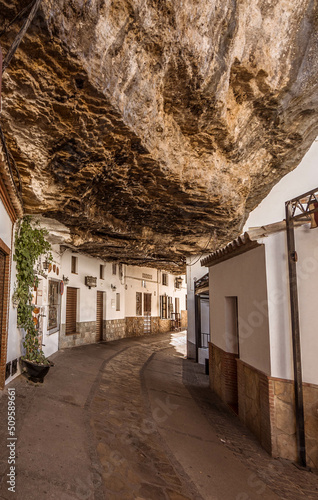 Streets and houses under the mountain of Setenil de las Bodegas, Cadiz. photo