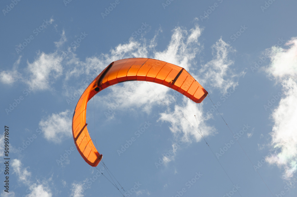 kitesurf sailing in the sky. with light blue and white background kitesurf sailing in the sky. with light blue and white background