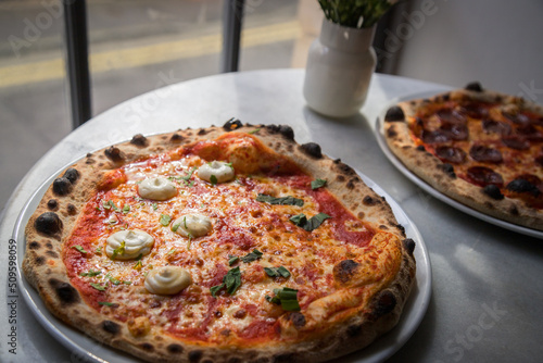 Margherita cheese and pepperoni pizza