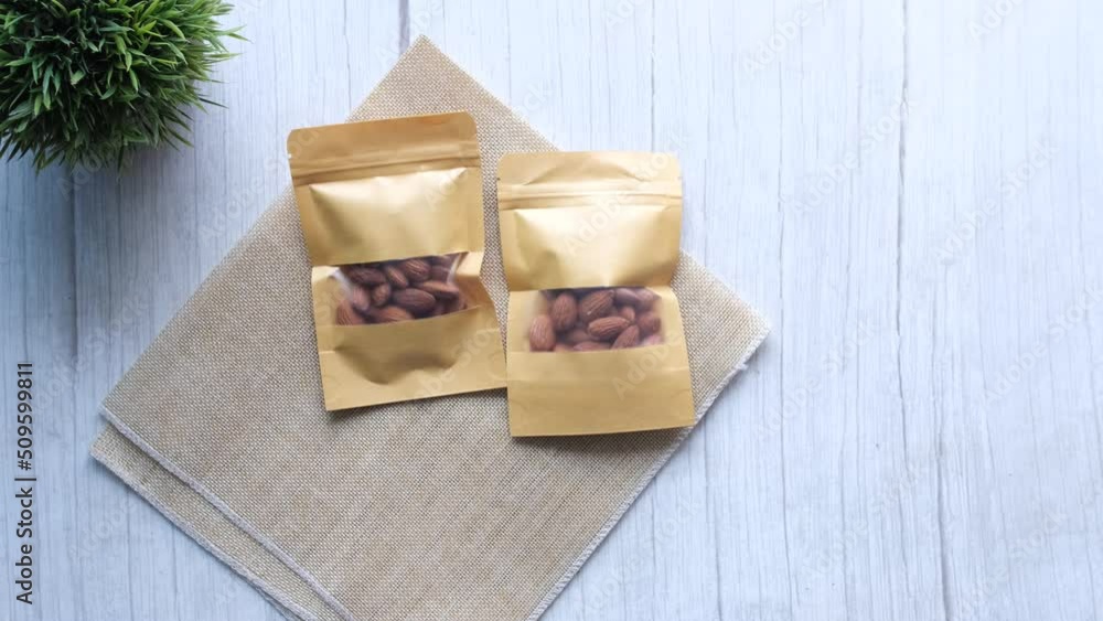 top view of almond nuts in a packet top view of almond nuts in a packet