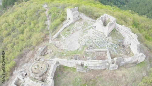 Aerial shot of medieval fortress Koznik , drone above the walls photo