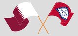Crossed and waving flags of Qatar and The State of Arkansas