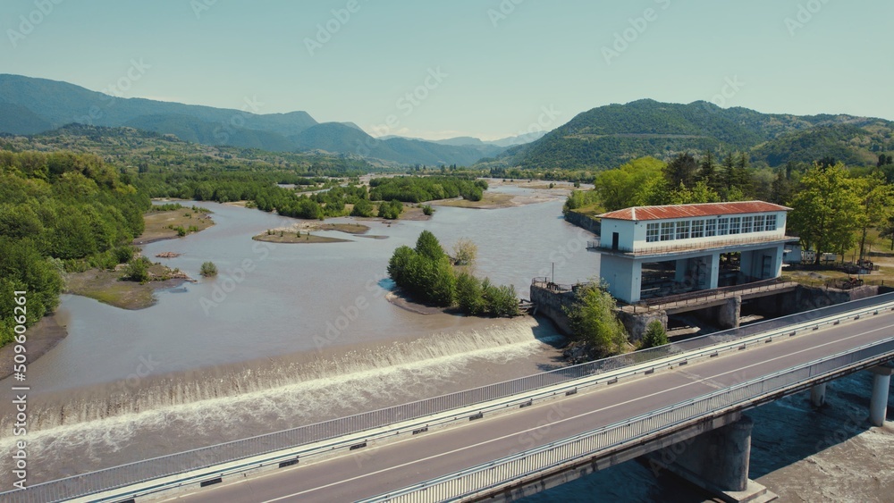 aerial view of a wide river and an old building on it. High quality photo