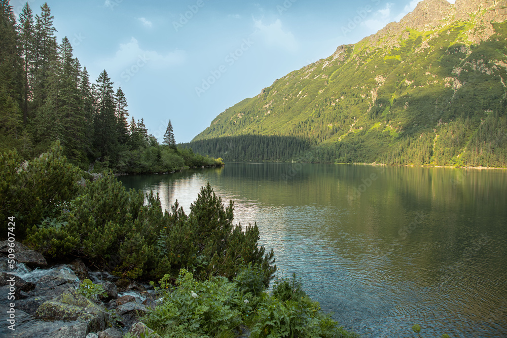 Tatra National Park, Poland. Famous mountains lake Morskie Oko Or sea eye lake in summer evening. 