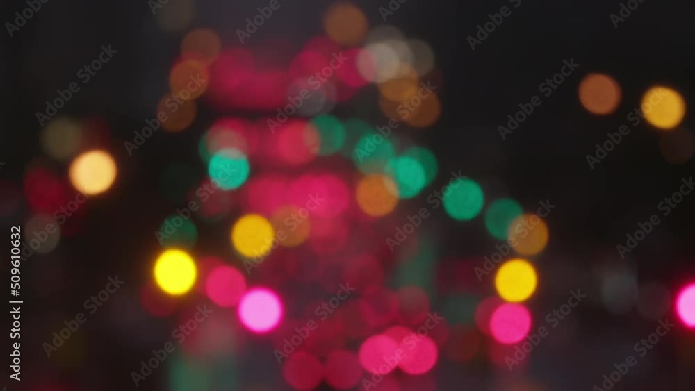 Slow-mo of a wet New York Manhattan main street at night with traffic, in winter with snow. Reflections red and green. Slow-mo of a wet New York Manhattan main street at night with traffic, in winter with snow. Reflections red and green.