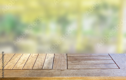 Empty rustic table against beautiful abstract summer background