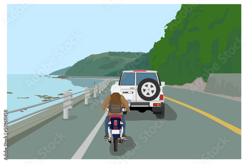 海辺の道路をドライブする自動車と女性ライダー