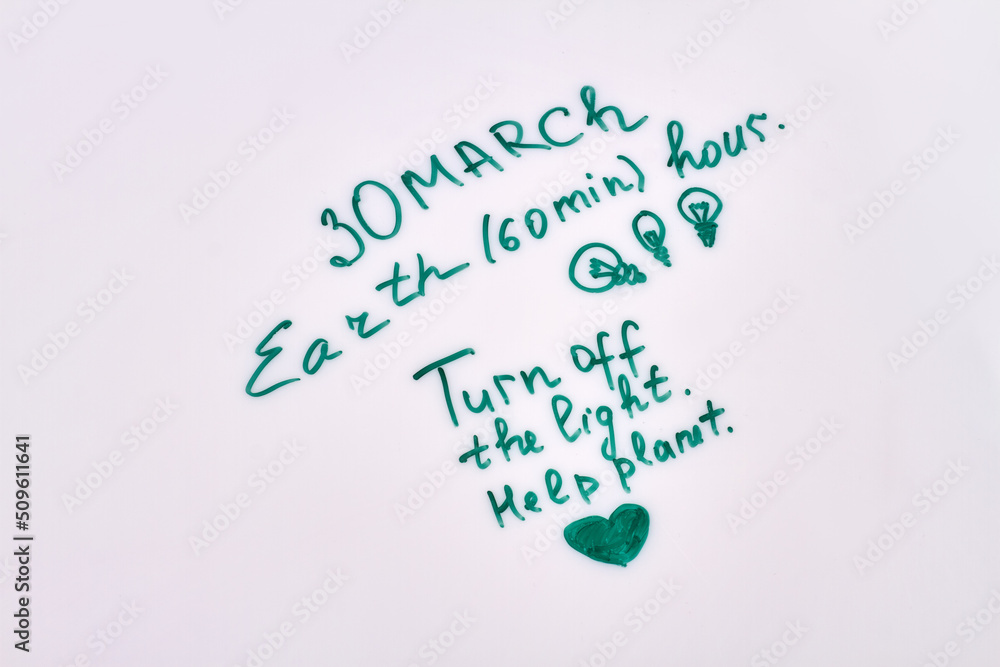 Fototapeta premium 30 march earth hour. Turn off the light save plannet. Handwriting on white background.