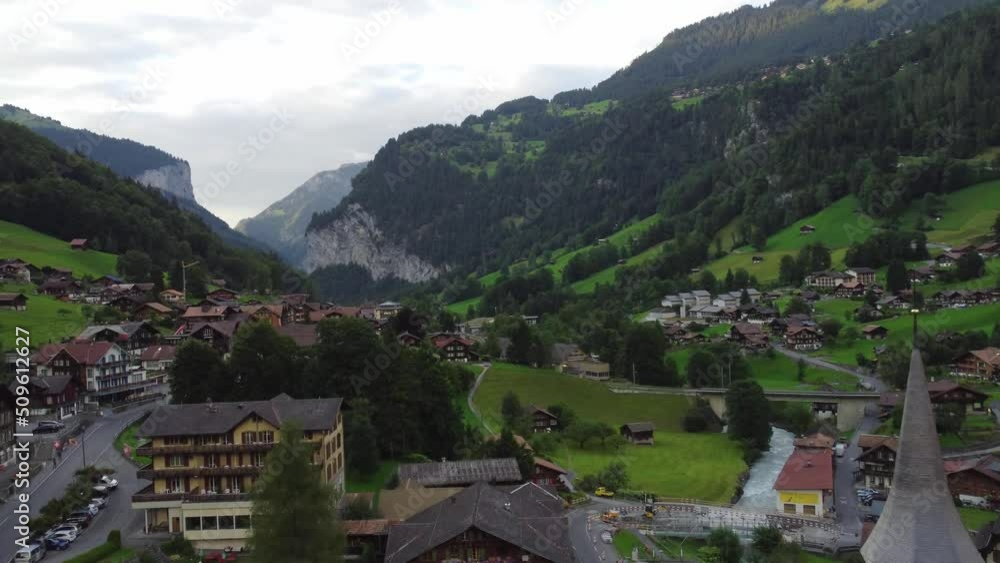 Aerial view over the village of Lauterbrunnen in Switzerland with its famous waterfall - drone footage. Switzerland. Europe. Swiss Alps. Drone footage 4K Aerial view over the village of Lauterbrunnen in Switzerland with its famous waterfall - drone footage. Switzerland. Europe. Swiss Alps. Drone footage 4K