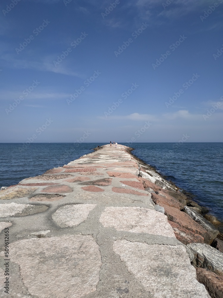 Breakwater, a structure made of stones, granite and cement on the seashore to reduce waves.