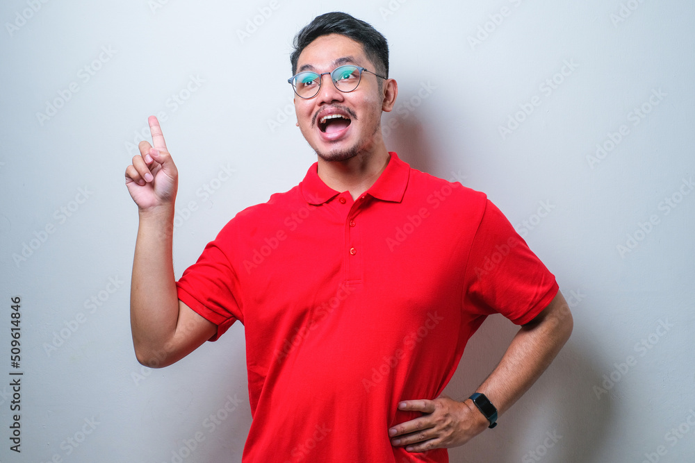 Asian man got an idea and show one finger Asian man got an idea and show one finger