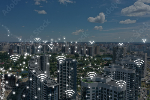 Picturesque view of city with buildings and wi-fi symbols