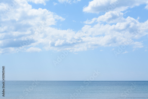 PIcturesque view of calm sea under cloudy sky