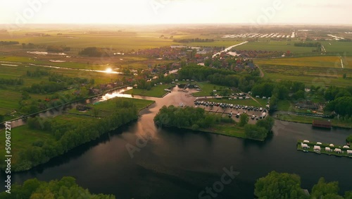 Aerial View Of Marina Near Waterstaete Ossenzijl Villas In Ossenzijl, Friesland, Netherlands. Wide Shot photo