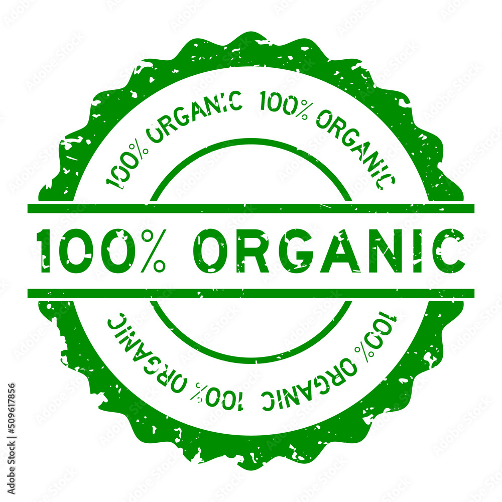 Grunge green 100 % organic word round rubber seal stamp on white background