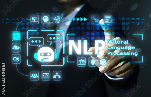 Fototapeta Naklejka Na Ścianę i Meble -  The businessman's hand reaches out to touch to activate NLP or Natural language processing to connect all activity as a chatbot artificial intelligence.