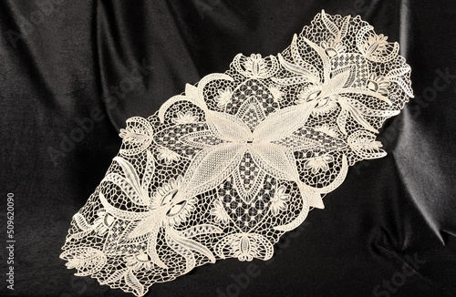 Fototapeta Naklejka Na Ścianę i Meble -  decorative lace on black background