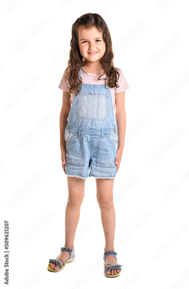 Cute girl 4-5 year old posing in studio white background Cute girl 4-5 year old posing in studio white background