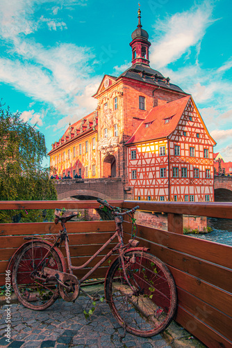 Bamberg Rathaus landmark building with a rusty bicycle in front of it.