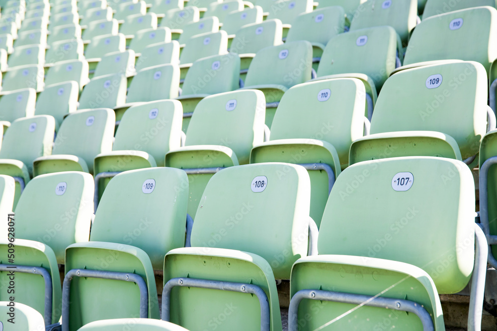 Naklejka premium Empty Plastic Chairs at the Stadium