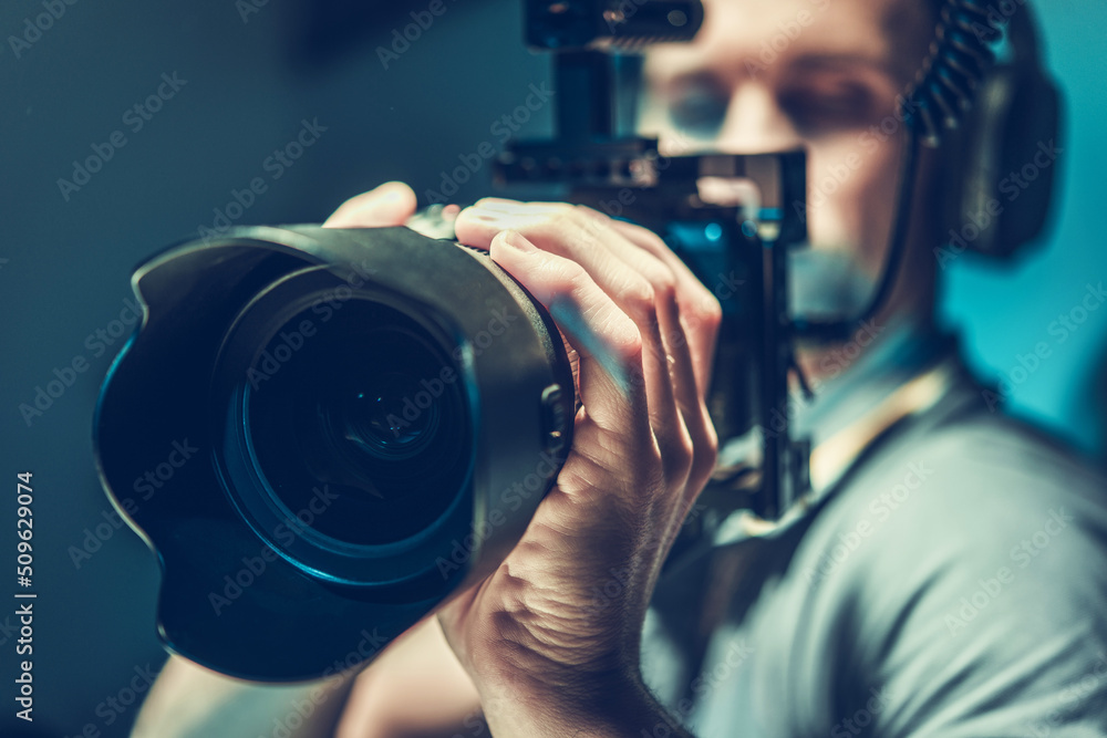Amateur Movie Maker Shooting a New Film with His Video Camera Amateur Movie Maker Shooting a New Film with His Video Camera