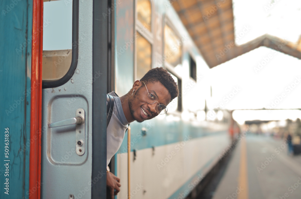 portrait of a smiling black man in a station portrait of a smiling black man in a station