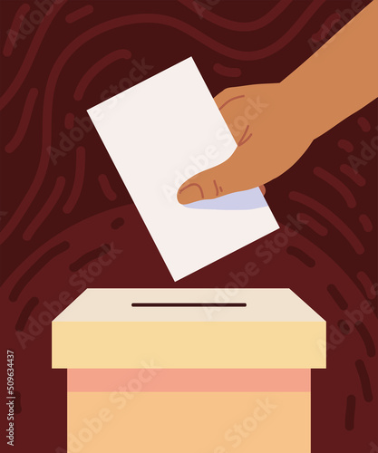 hand with voting ballot