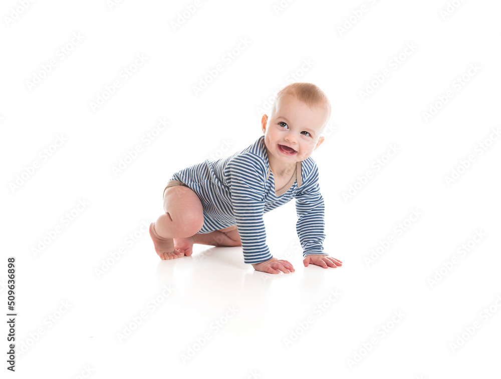 Cheerful baby boy toddler on white studio background Cheerful baby boy toddler on white studio background