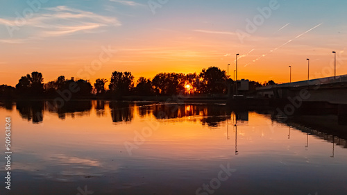 Beautiful sunset with reflections near Plattling, Isar, Bavaria, Germany